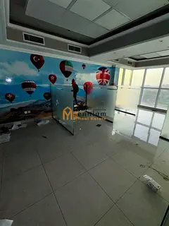 Office for Rent in Al Majaz 1, 965 Sqft, 7 Private Rooms, Glass Façade, Waterfront View, Parking In