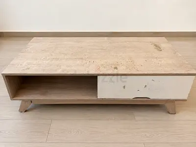 Wooden coffee table with storage drawer — used, light wear