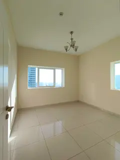 Annual Rent – Al Khan Corniche, Sharjah Spacious 2-bedroom apartment with a lake view. Property Fe
