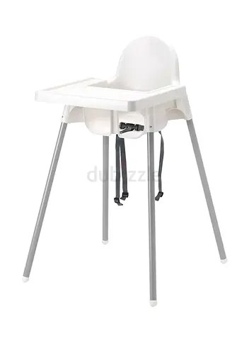 White minimalist baby high chair with safety straps