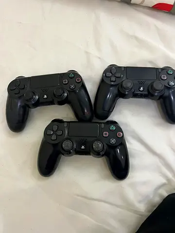 Three Sony DualShock 4 controllers - used, working condition