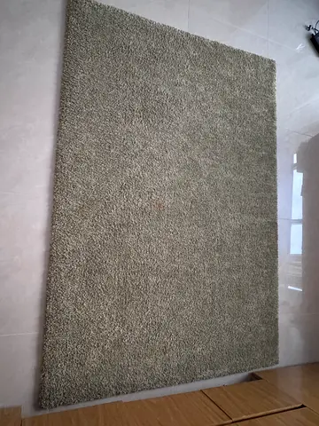 Dark green shaggy area rug – good condition, 1.6m x 1.2m (approx.)