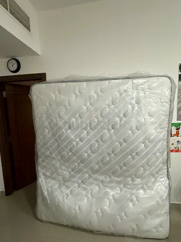 King mattress in plastic wrap - good condition