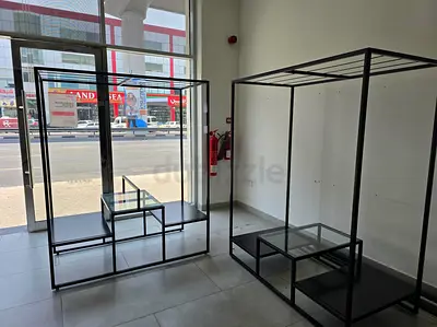 Metal clothing display racks with glass shelves - set of 3