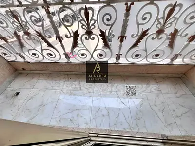 For annual rent in Ajman, Al Hamidiya area: two bedrooms, a living room, a bathroom, and a balcony.