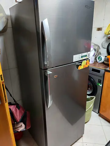 Used double-door refrigerator - good condition, stainless finish