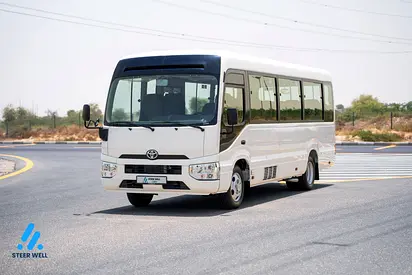 2025 Toyota Coaster 23-Seater Bus 4.0L Diesel RWD GCC Specs Full Option White