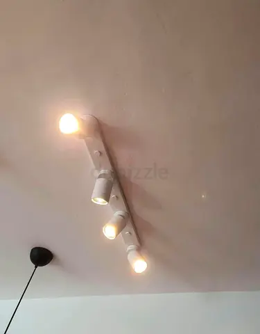 3 Ceiling-mounted 4-bulb white track spotlight fixture - 350 for the 3 Units