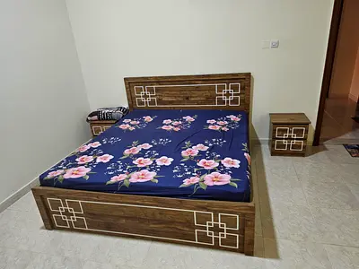 Wooden king Bed with dual medi mattress. New Good Condition