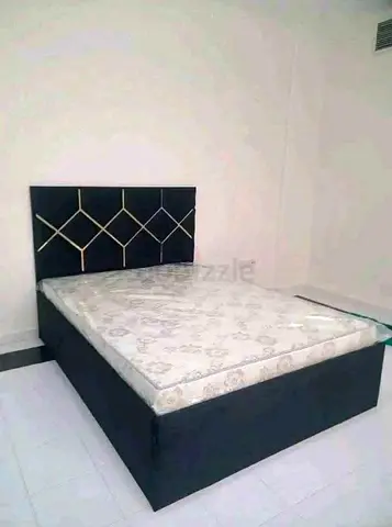 Queen storage bed with mattress - black upholstered headboard