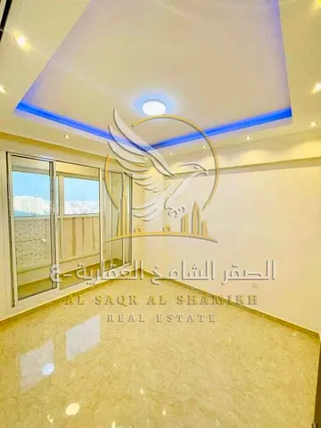 3-bedroom apartment with a living room for annual rent with one month free and free parking in Al Rawda 3, Ajman. Very strategic location on the exten