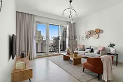 Modern 1BR w/ Stunning Canal Views- Creek Harbour | Ideal for Mid - Term, Monthly &amp; Weekly Stays