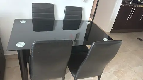 Black Glass Top Dining Table with 4 Faux Leather Chairs