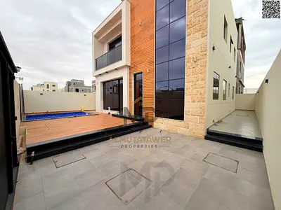 For sale, including registration fees: Modern villa with central air conditioning and private swimming pool. Freehold.