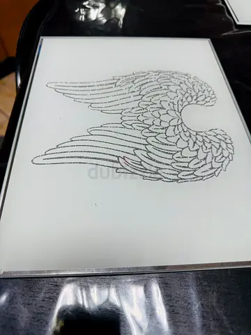Brand New Glass Table Mats with Feather Design