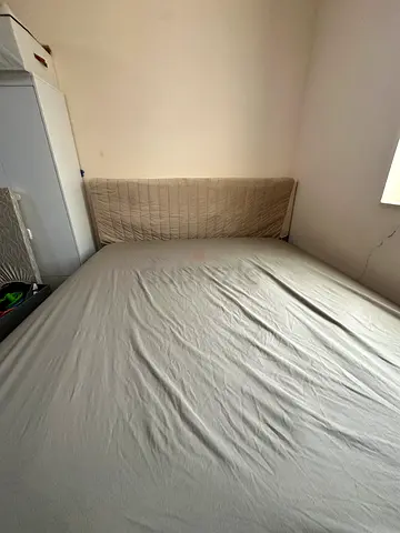 King bed and padded headboard - good condition