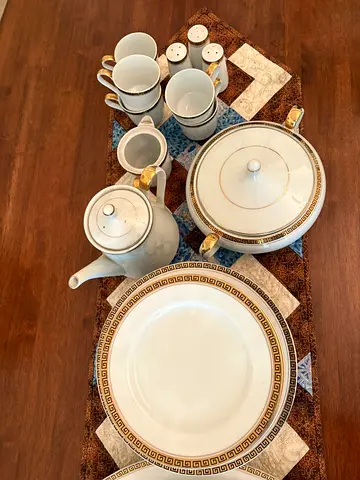 Chinaware Dinner set white with Gold Trim.