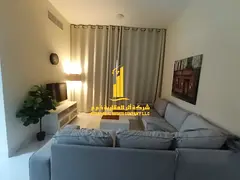 Luxury apartment, second occupancy, one bedroom and living room with a balcony and open view. Ajman,