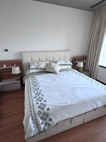 King-size upholstered bed frame with headboard, bedside tables, chest of drawers, full-length mirror