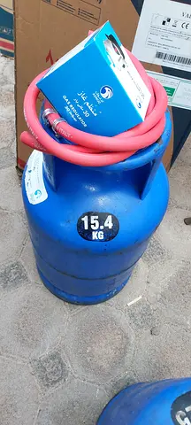 Adnoc Gas cylinder regulator and New two burner stove
