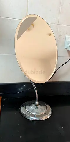 Adjustable tabletop makeup/vanity mirror with stand