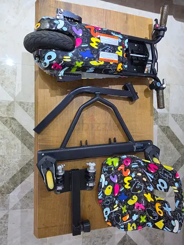 An electric scooter that drifts-changed battery-with two keys-has three modes-brand new battery
