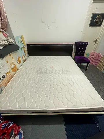 For sale King size mattress - good condition with free frame