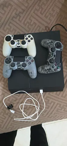 Sony PlayStation 4 with 4 DualShock 3 Controllers urgent sales