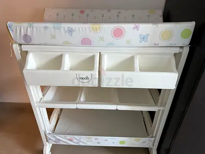 Baby changing table and bathtub