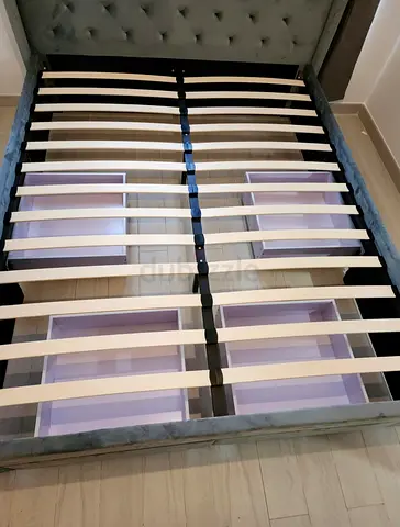 Bed frame with 3 sliding drawers
