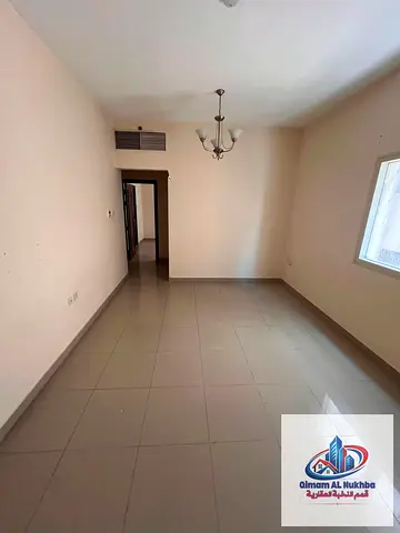 شقة غرفة وصالة للإيجار السنوي في البوطينة | تكييف وغاز مركزي | 2 حمام | بدون رسوم | تسهيلات في الدفع تصل إلى 6 دفعات | 30,000 درهم