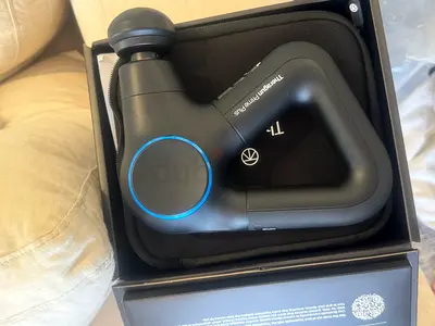 Theragun massage gun