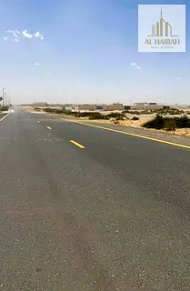 Residential land for sale in Al Hooshi, Sharjah. Prime location and price.