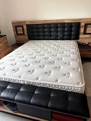 Queen size bed frame without mattress and headboard - good condition