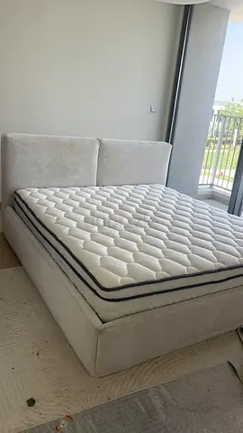 Queen upholstered bed frame with mattress - light beige