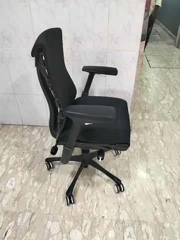 Ergonomic Black Office Chair with Adjustable Armrests and Lumbar Support