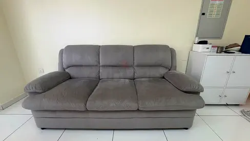 3-seater grey fabric sofa in good condition and sofa table.