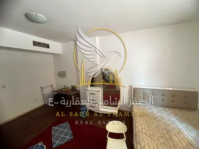Studio apartment for annual rent in Al Jurf 2 Ajman Spacious studio with a separate kitchen central air conditioning and modern finishes Close