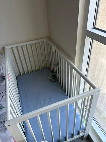 White wooden baby crib / cot in good condition