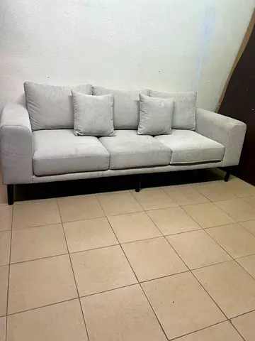 Light grey 3-seater fabric sofa with cushions