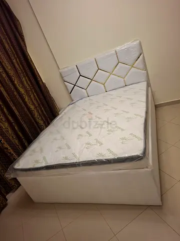 Queen upholstered bed frame with mattress - barely used