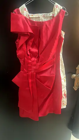 Red knee-length formal dress with floral lining, size approx M