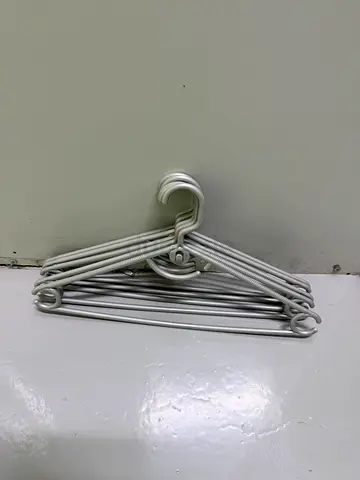 Set of slim grey clothes hangers - 5 pieces