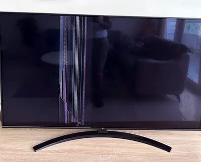 55-inch LG LED TV with cracked screen