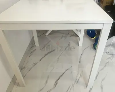 Simple white square dining table - good condition with 4 chairs