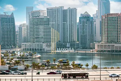 Fully Furnished 1 BR | Canal & Burj Views | 12 Cheques
