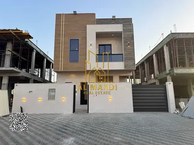 السعر شامل رسوم التسجيل والتمليك  موقع ممتاز تمليك حر  فيلا للبيع في عجمان  تصميم عصري بواجهة حجرية وتشطيبات شخصية فاخرة للغاية، مع مساحة إضافية،.