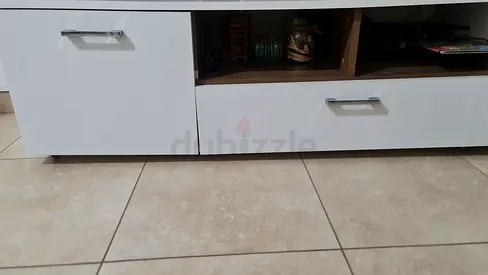 White low TV entertainment unit with drawers and shelves