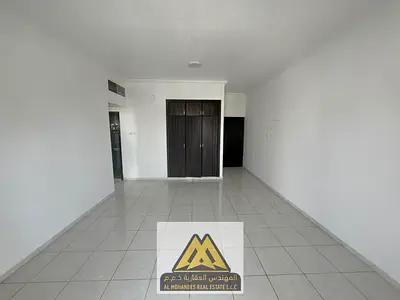 Annual rent: 1-bedroom apartment in Al Rashidiya 3, Ajman. Balcony, wardrobes, central AC, free maintenance, free parking, near Ajman One Towers. AED