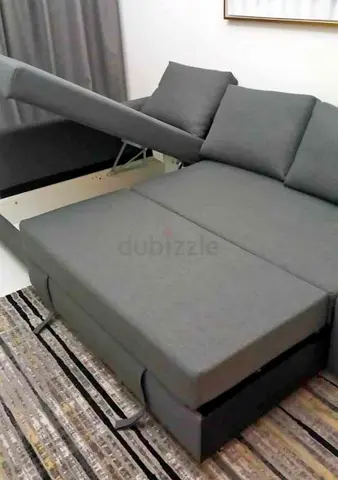 IKEA L shap Sofa store cum bed you can fix the storage